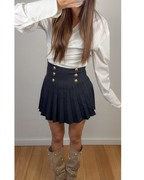 Toor zwart rokje met gouden knoopjes